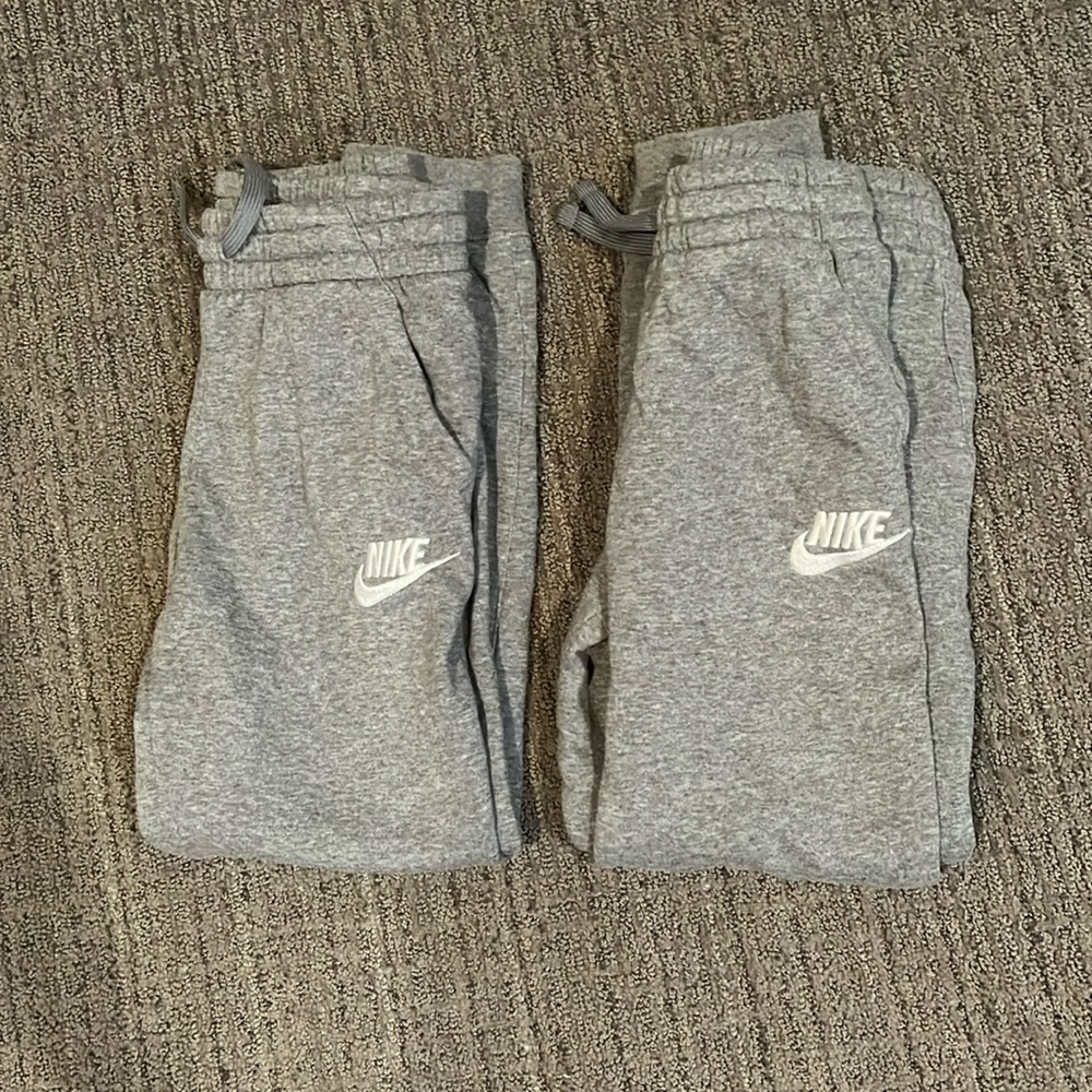 2 pairs of Nike Joggers